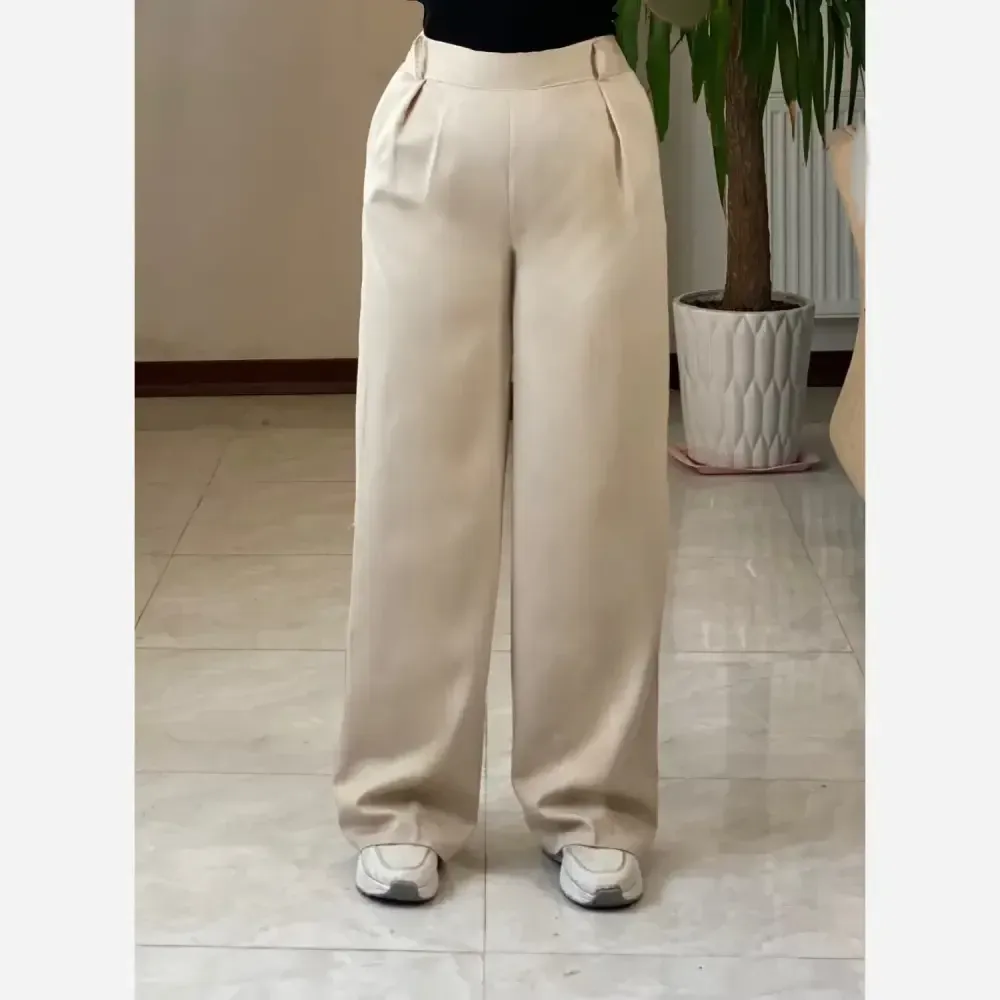 شلوار بگ زنانه جنس تنسل میله ای خنک و سبک در 4 رنگ متنوع سایز 44 تا 50