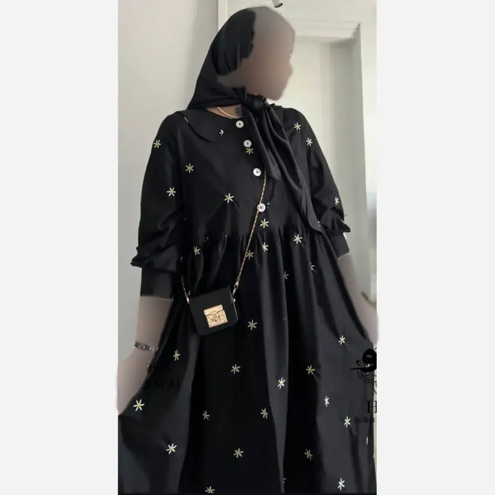 پیراهن زنانه مدل بابونه جنس کرپ فلور درجه یک فری سایز رنگ مشکی