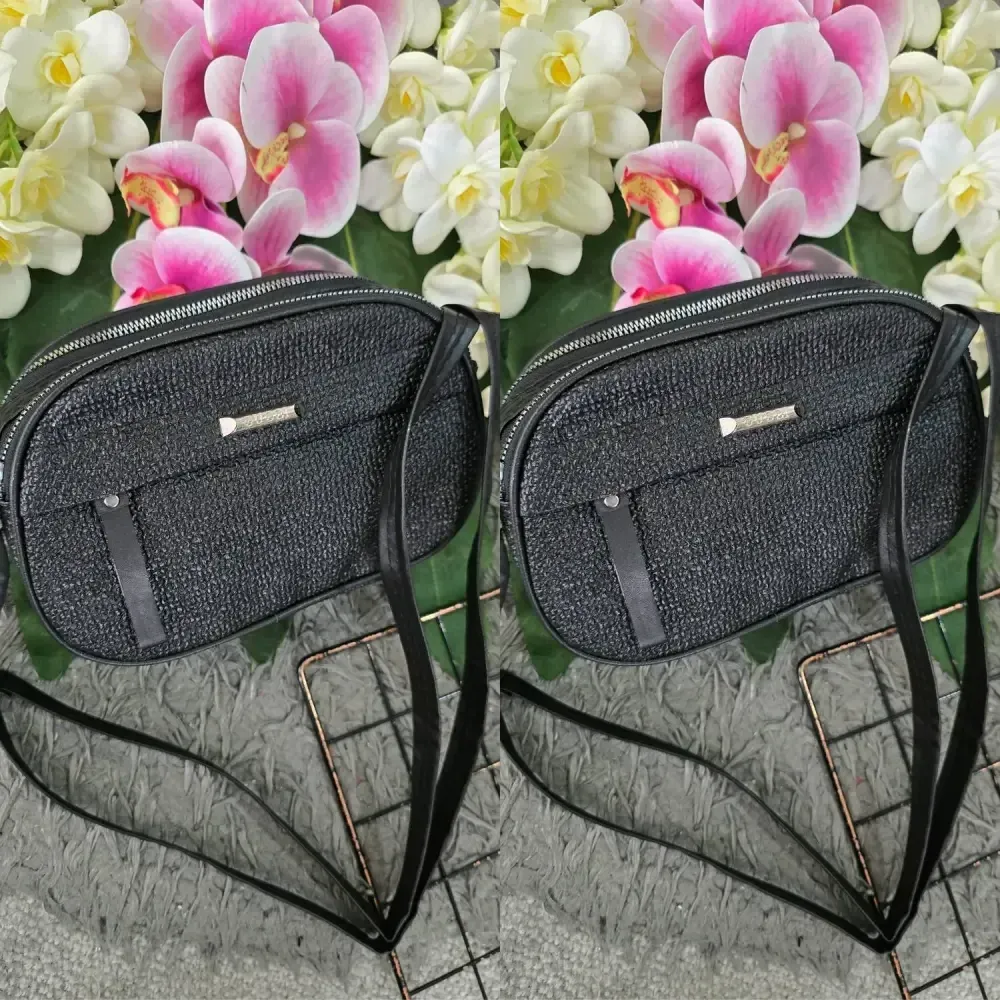 کیف زنانه آیدا جنس چرم طرح کنفی سه خونه