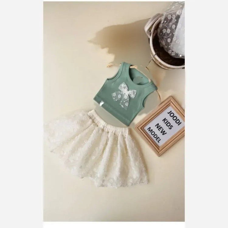 ست کراپ و دامن دخترانه مدل دلوان جنس تاپ پنبه و دامن تور دانتل (2)