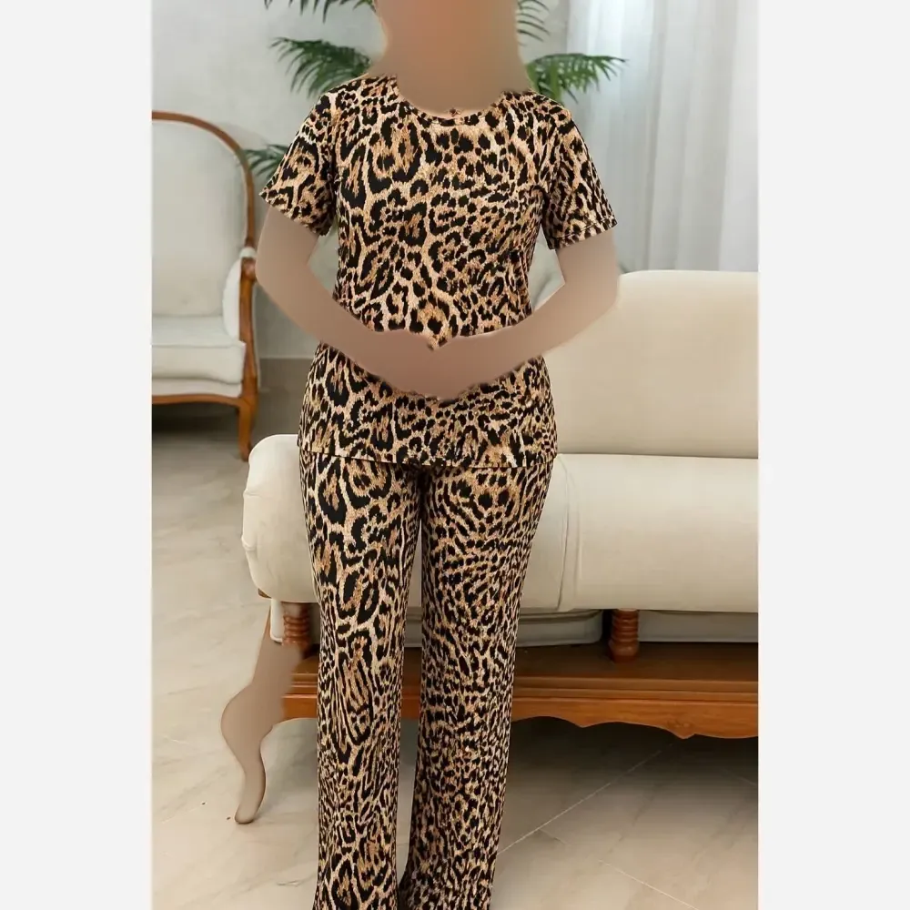 ست تیشرت و شلوار زنانه طرح پلنگی جنس فلامنت گیاهی فول کش سایز بزرگ فری سایز