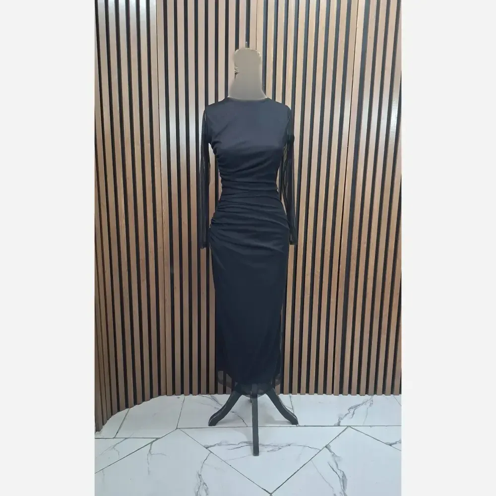 پیراهن مجلسی زنانه مدل نیلو جنس تور آستردار رنگ مشکی قد 135