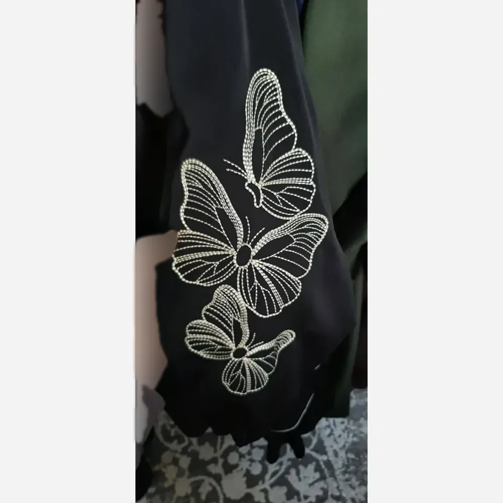 عبا زنانه مدل رند چیندار پارچه الیزه مشکی گلدوزی شده