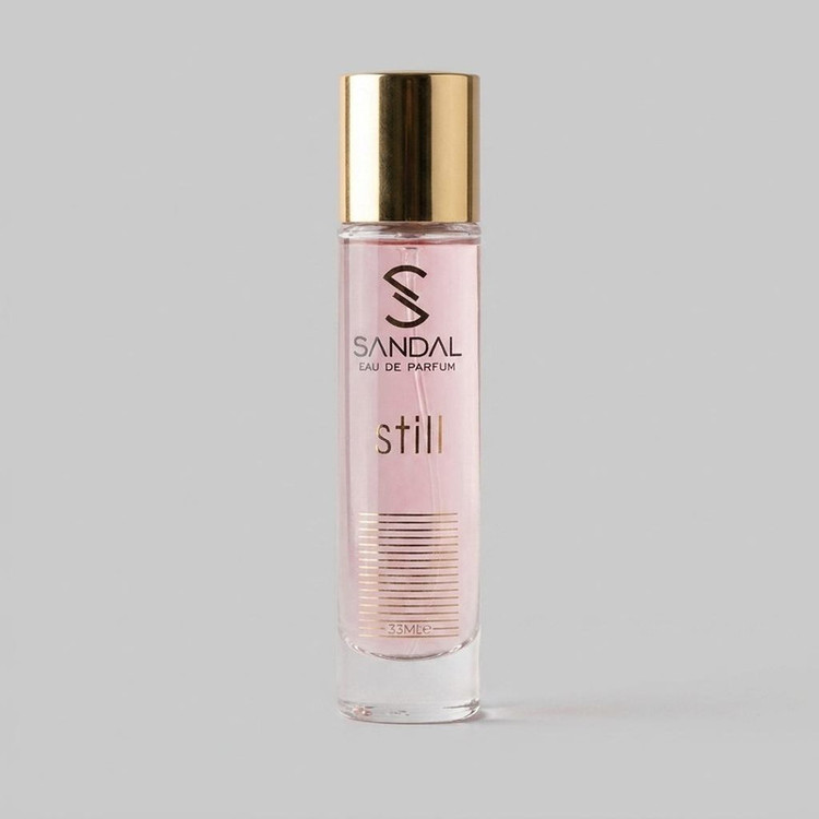 عطر جیبی زنانه صندل مدل still jennifer lopez با رایحه گلی و تند حجم 33 میلیلیتر