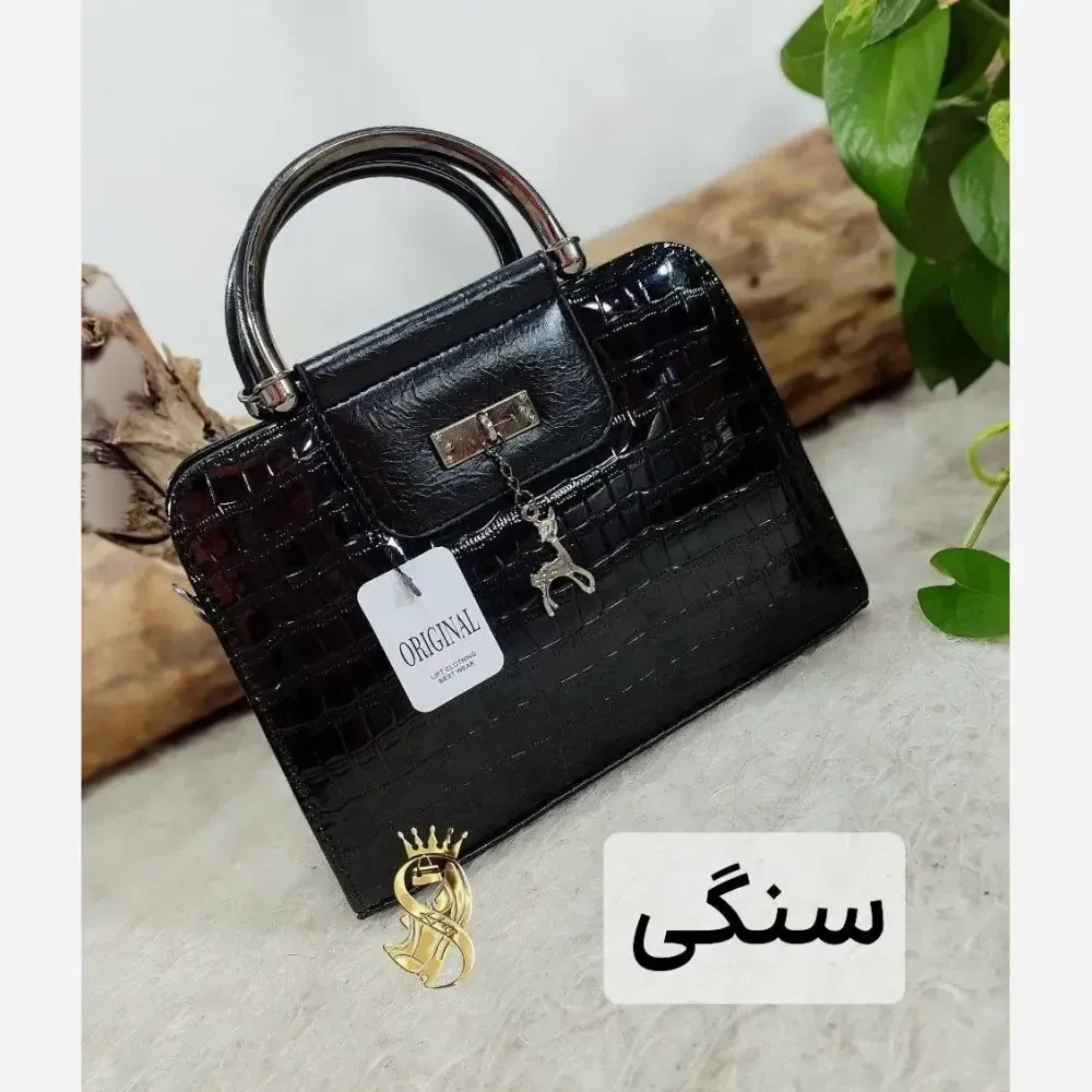 کیف مجلسی زنانه ورنی مدل اهو ابعاد 19 در 25 سانتیمتر