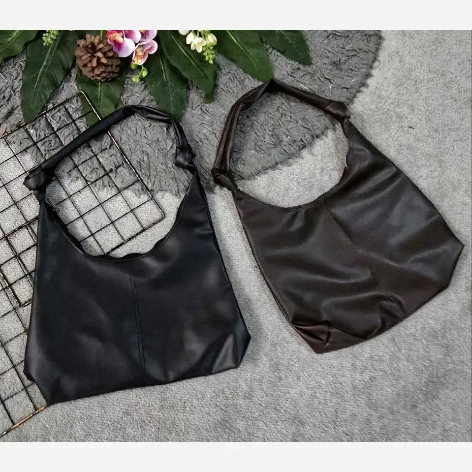 کیف دوشی زنانه چرمی بند گره ای ابعاد 30 در 40 سانتی متر