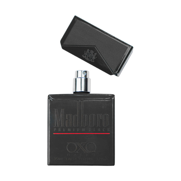 عطر جیبی اکس بالت مدل madboro premium black با رایحه گرم حجم 35 میلیلیتر