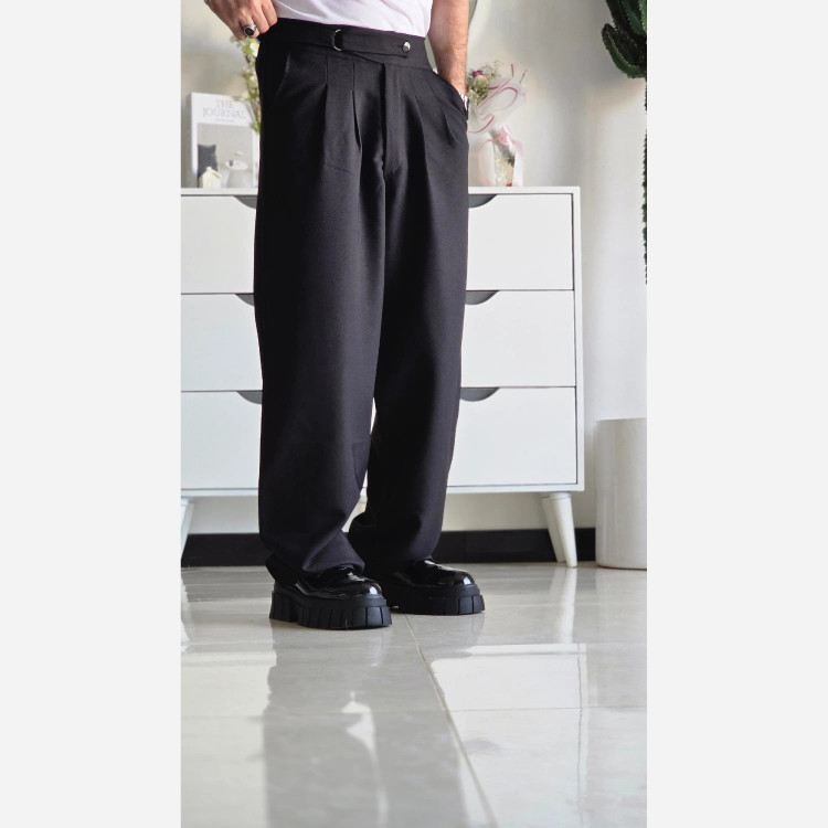 شلوار بگ پارچه ای کجراه مشکی کمر ایتالیایی پیله دار زنانه سایز L تا 3XL