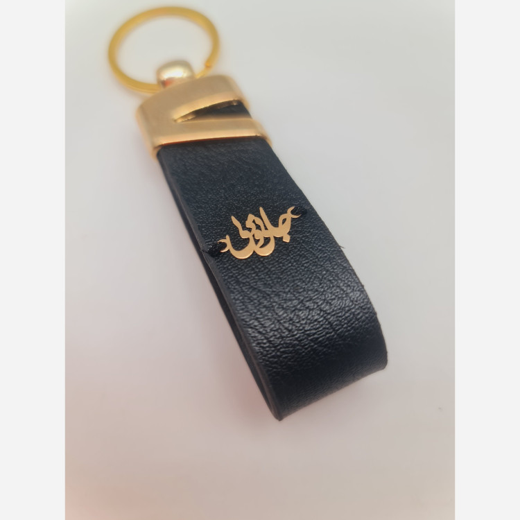 جاسوییچی چرم با پلاک طلا طرح جانی و دلی
