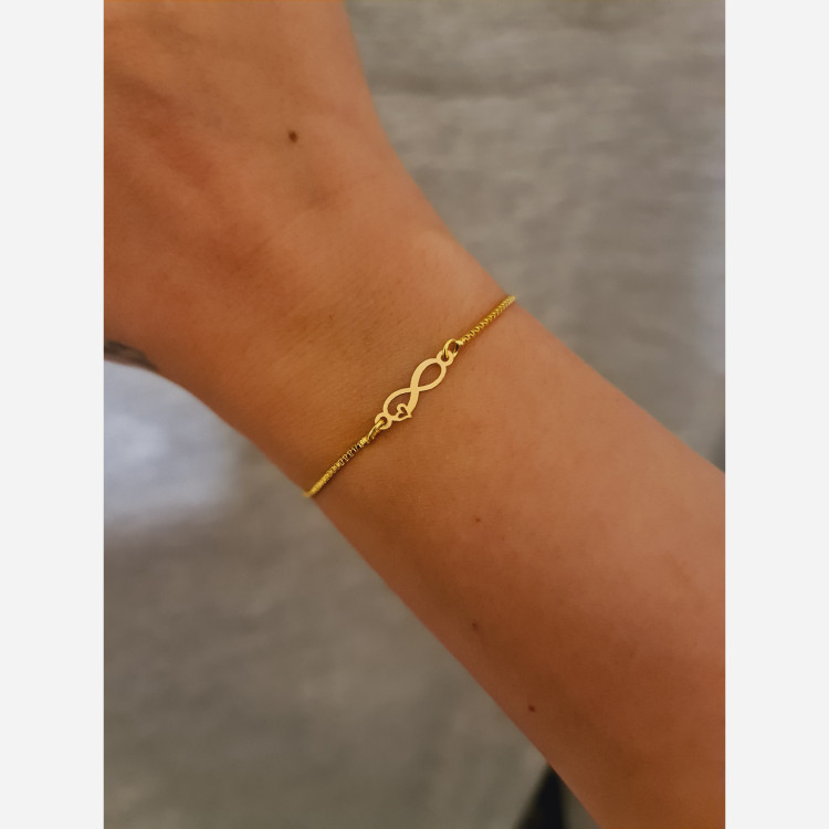 دستبند با پلاک طلا طرح بینهایت و قلب بند استیل طلایی